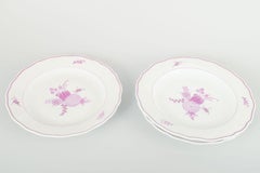 Meissen, Germany. Set of three porcelain dinner plates with lilac floral motif.