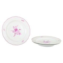 Meissen, Germany. Set of three porcelain dinner plates with lilac floral motif.