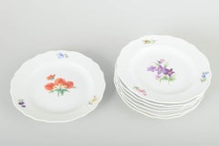 Meissen, Germany. Seven porcelain plates with floral decoration. Ca. 1930s