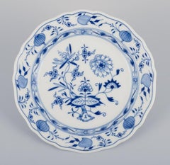Meissen, Germany, three Blue Onion-patterned plates in porcelain.