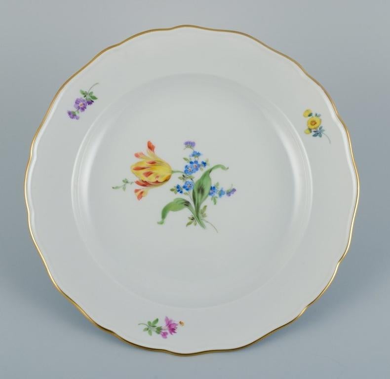 Meissen, Germany. Three large dinner plates in porcelain hand painted with various floral motifs and gold rim.
Approx. 1930s.
In perfect condition.
Third factory quality.
Marked.
Dimensions: D 25.5 cm.
