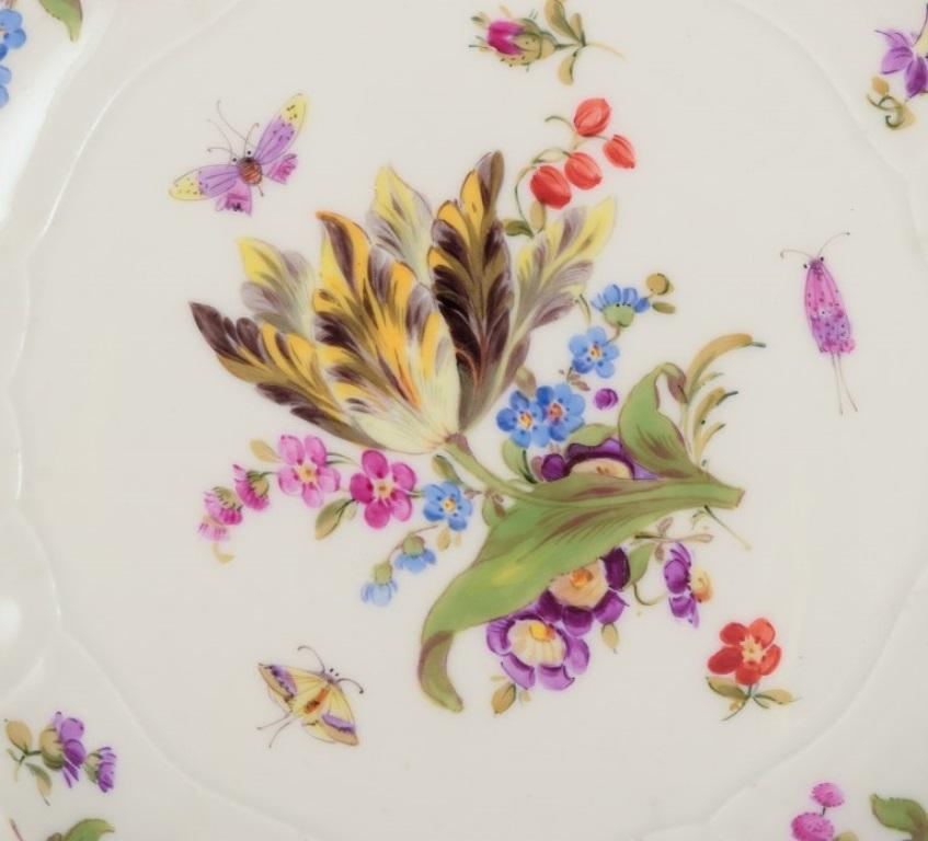 Porcelain Meissen, Germany. Three plates in porcelain with flowers and butterflies For Sale