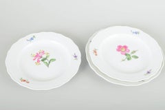 Meissen, Germany. Three porcelain salad plates with floral decoration. Ca. 1930s