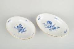 Meissen, Germany. Two oval serving dishes in porcelain with blue floral motifs.
