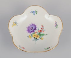Meissen, Germany. Two porcelain bowls hand-painted with polychrome flowers.