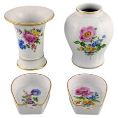 Antique Meissen, Germany. Two vases and two small bowls in hand-painted porcelain.