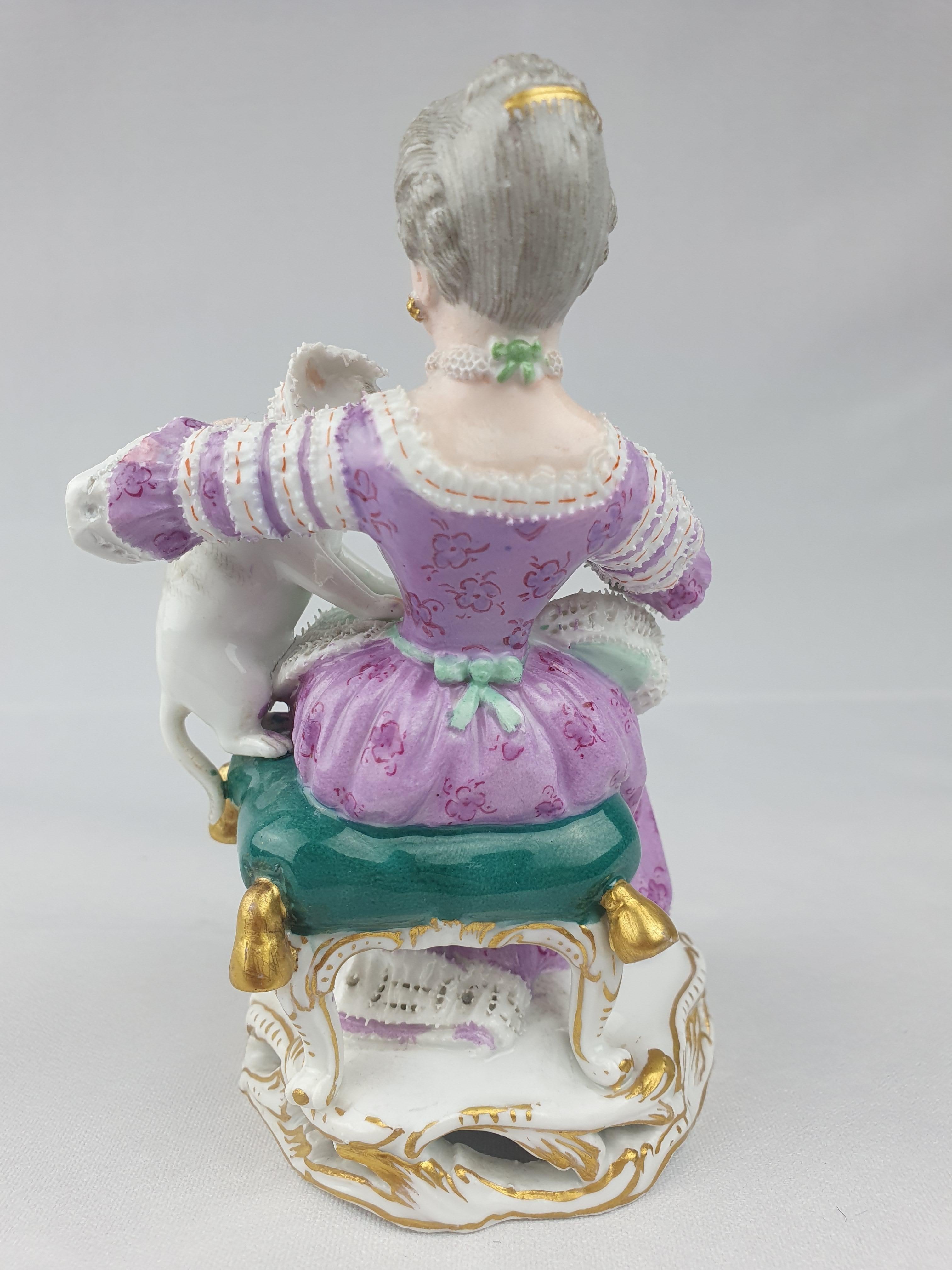 Meissen figure of a girl holding a cat on her lap which she is feeding with milk from a saucer. First modelled c1750.

Circa 1870

Height 12cm / 4.72inches

Model number B94

Painters mark 58

Blue crossed swords.