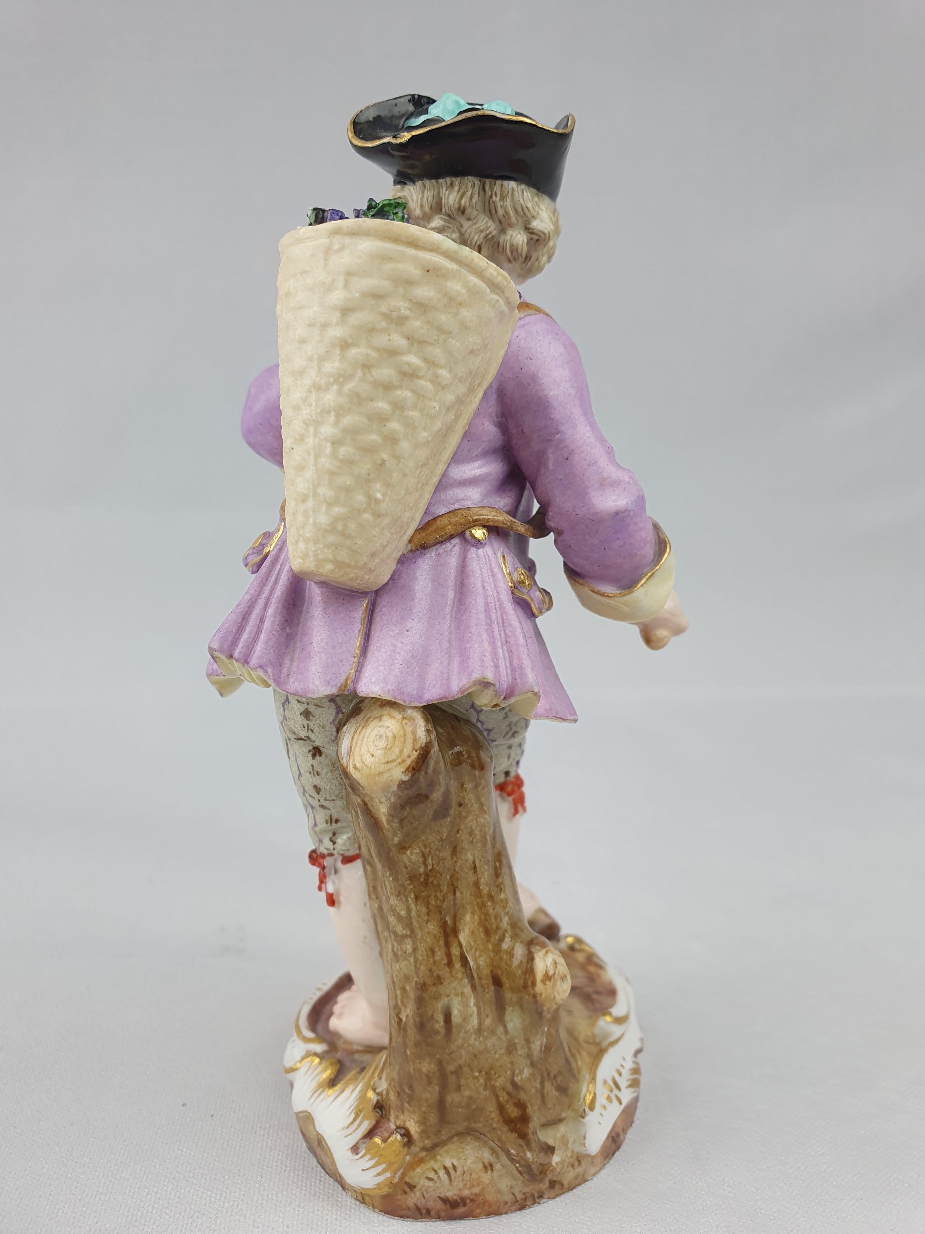 Meissen Grape Collector first modelled by J J Kaendler 1740

Number 8 From a series of Gardners

circa 1870

Height 13.5cm.