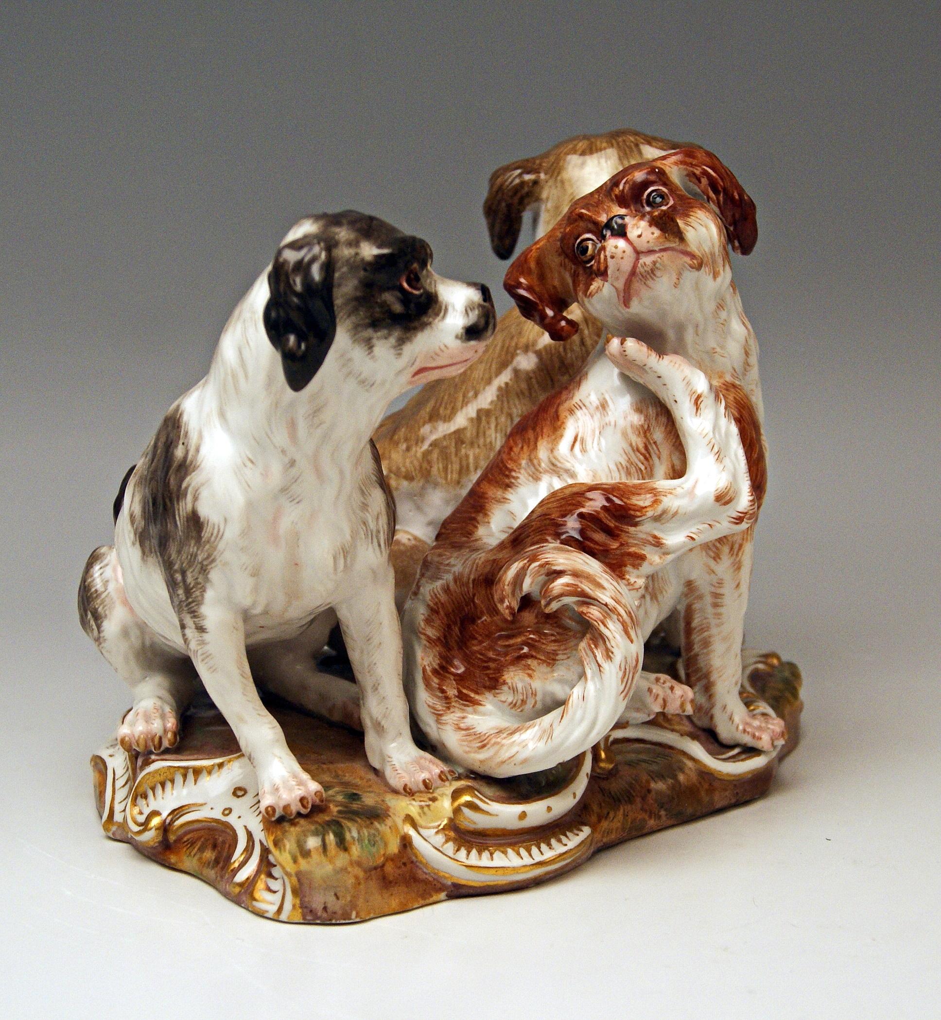Meissen Most Lovely Animal Figurines: Group of Three Dogs

-- Stunningly Painted in Most Lifelike Manner
(the dogs are painted in dark and bright brown as well as red brown and white). Earthen base with Rocaille ornaments existing.
Please