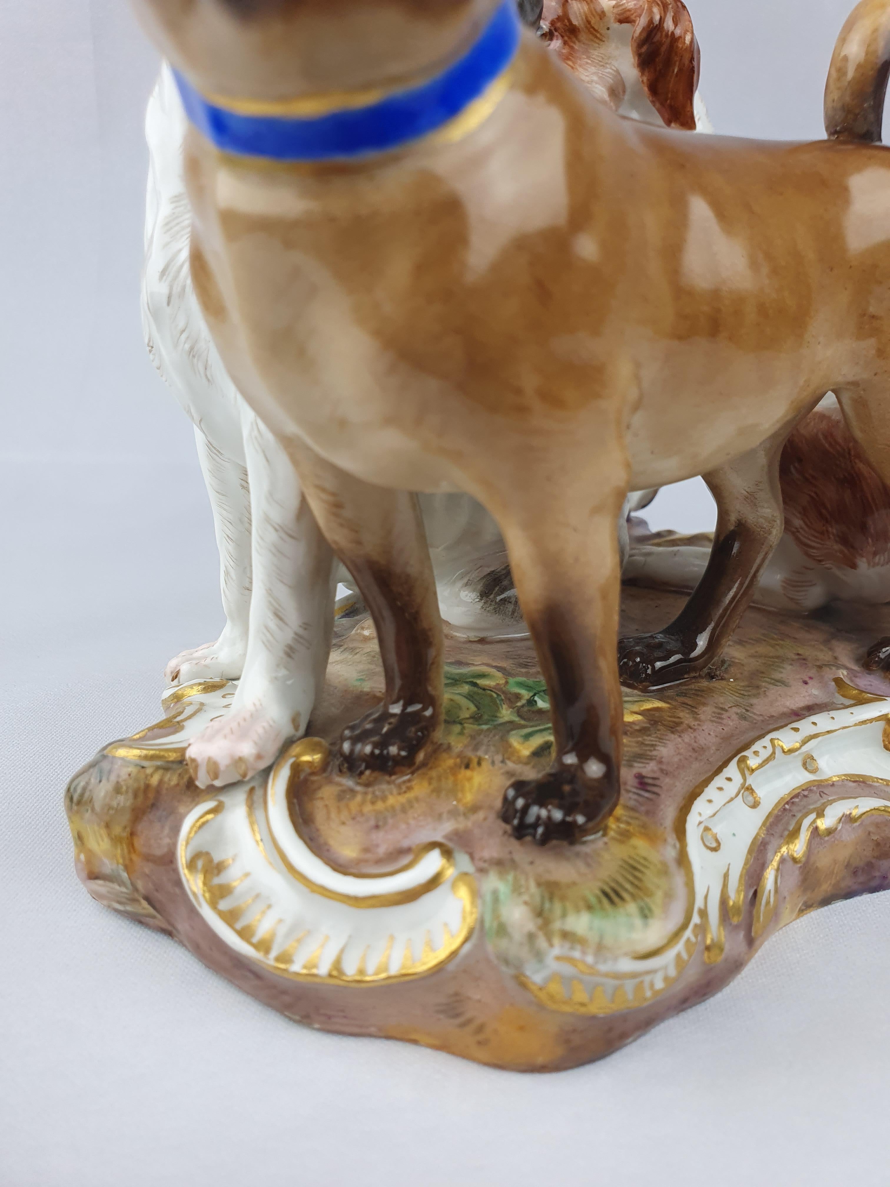 German Meissen Group of Three Dogs Two Bolognese Spaniels and a Pug Dog For Sale