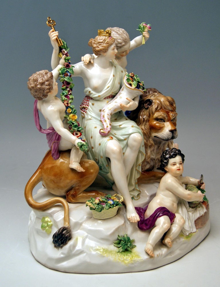 Meissen gorgeous & huge group of figurines which are Allegory of Earth assembled around a Lion's Figurine.

Size:
Height: 24.5 cm (= 9.64 inches) 
Width of base: 22.5 cm (= 8.85 inches)
Depth of base: 17.0 cm (= 6.69 inches)

Manufactory:
