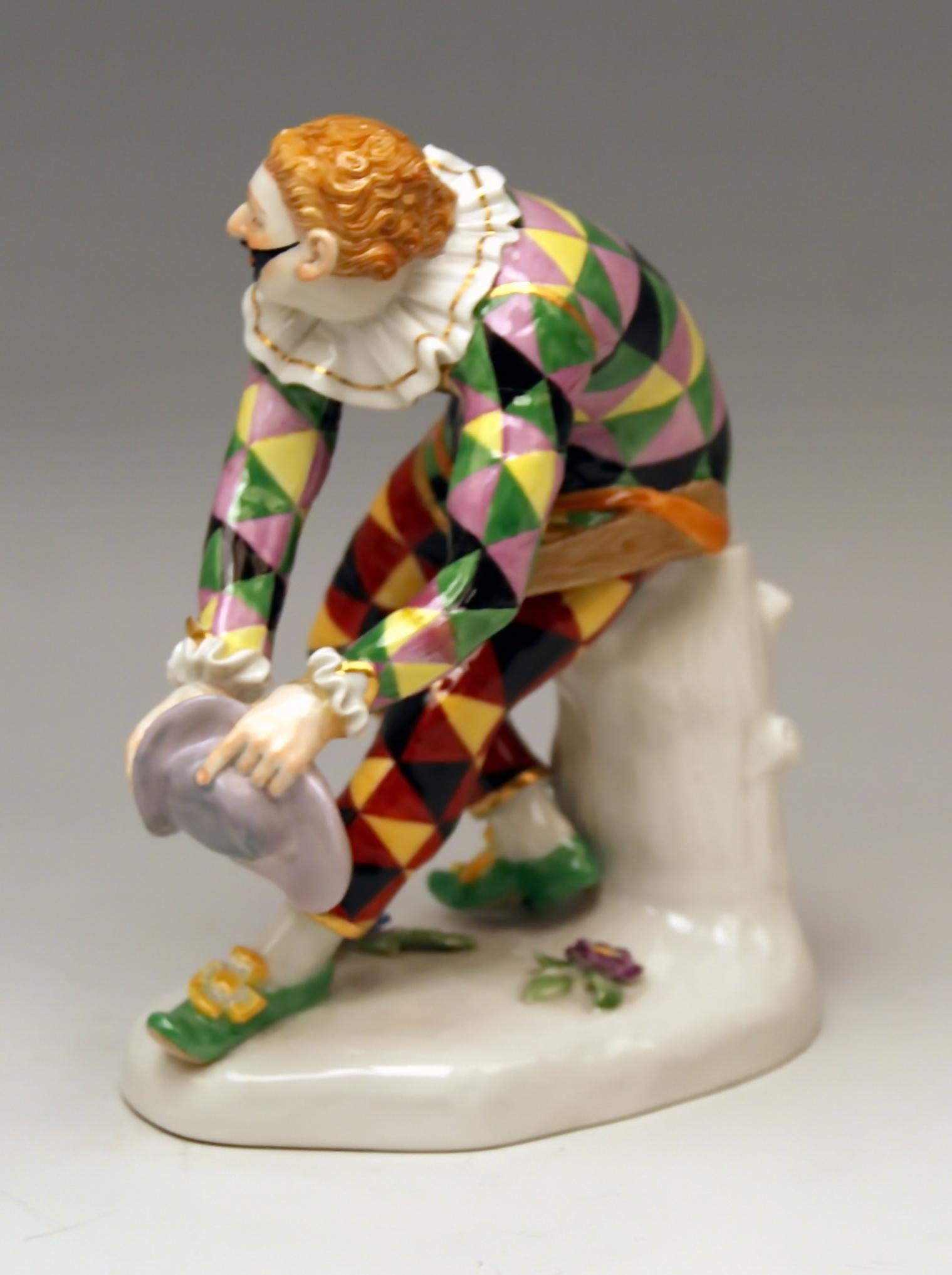 Meissen most lovely Greeting Harlequin 
model 632 / 64529
made second half of 20th century

Size:
height: 6.29 inches (= 16.0 cm)
length of base: 4.99 inches (= 12.7 cm)
depth of base: 3.03 inches (= 7.7 cm)

Manufactory: