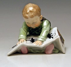 Meissen Hentschel Child Baby Looking at Picture-Book Figurine Model U 149