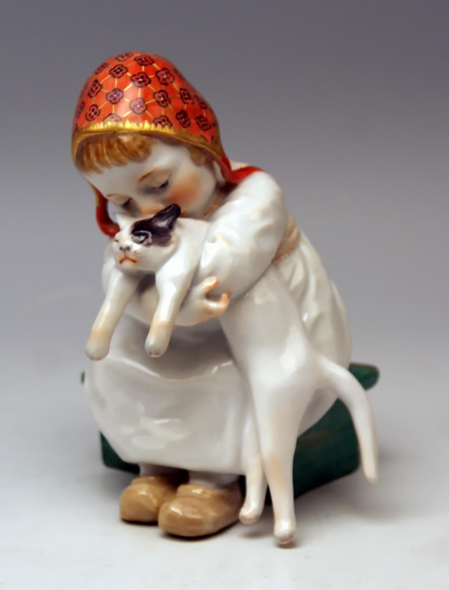 Meissen Lovely Hentschel Figurine: Girl Holding a Cat in her Arms / Model W 121

Size:
Height 4.72 inches (= 12.0 cm)
Depth 3.74 inches (= 9.5 cm)
Width 3.74 inches (= 9.5 cm)

Manufactory: Meissen
Hallmarked: Blue Meissen Sword Mark (bottom