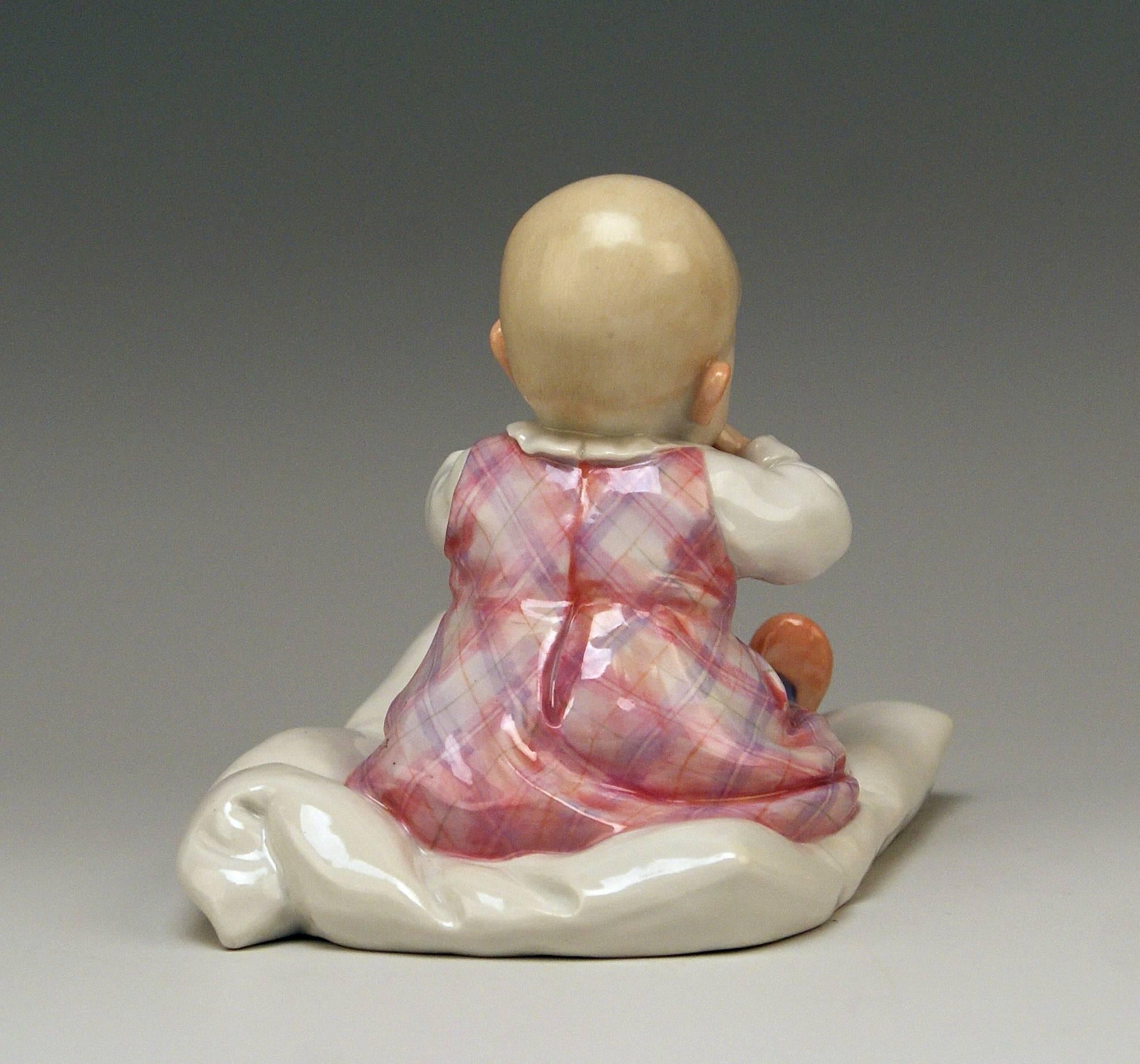 Painted Meissen Hentschel Child Sitting on Cushion Figurine Model U 150 Made circa 1905