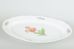 Meissen. Large oval serving dish in porcelain with floral motif. Ca 1930s