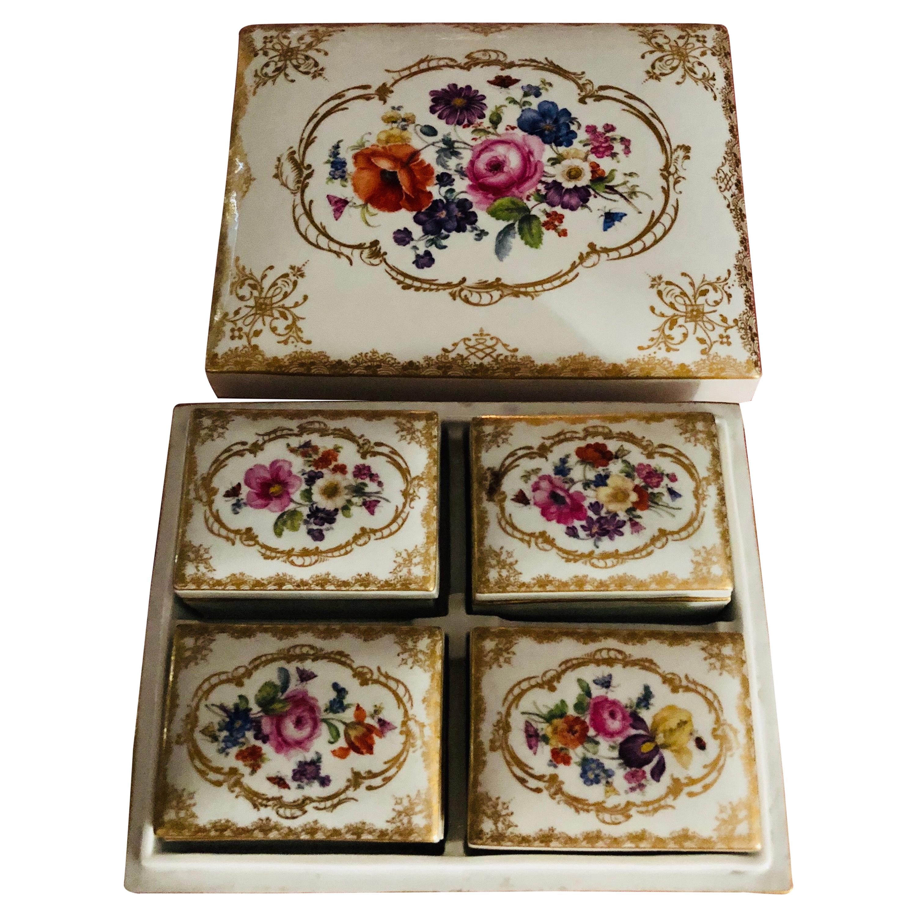 Meissen late 19th century floral painted box which has four smaller boxes inside it. If you look through the pictures, you can see closeups of the intricate detail in the different flower paintings that are painted on each of the boxes. The Meissen