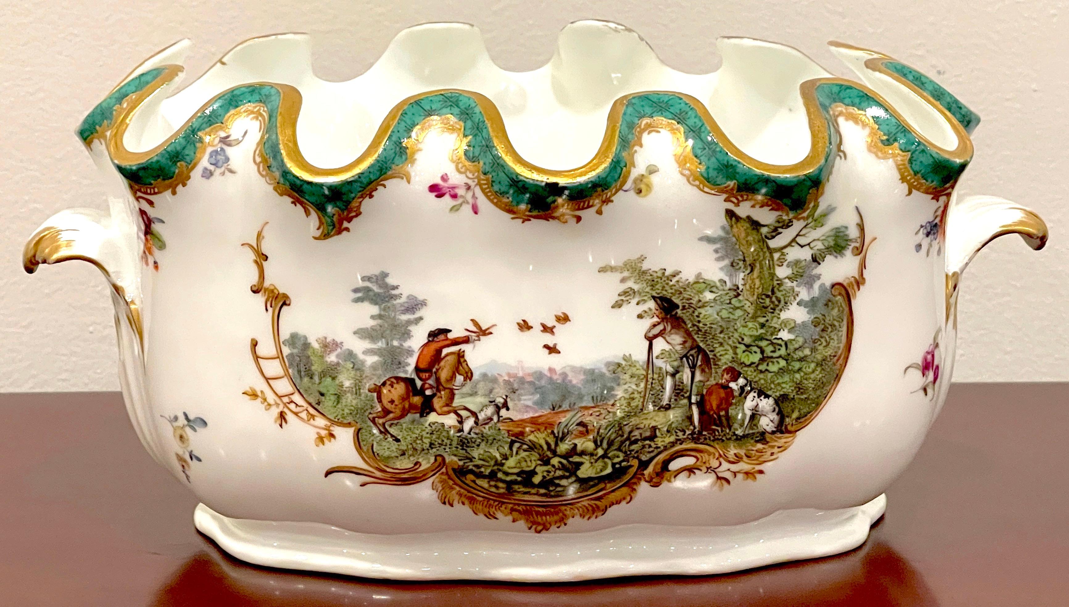 Meissen Marcolini Period (1774-1814 ) Monteith Bowl, Equestrian Hunt Motif 
Germany, 1774-1814 Meissen Marcolini Period

A stunning example, a rare form in 18th century Meissen Porcelain, this two handled oval monteith bowl with scalloped green