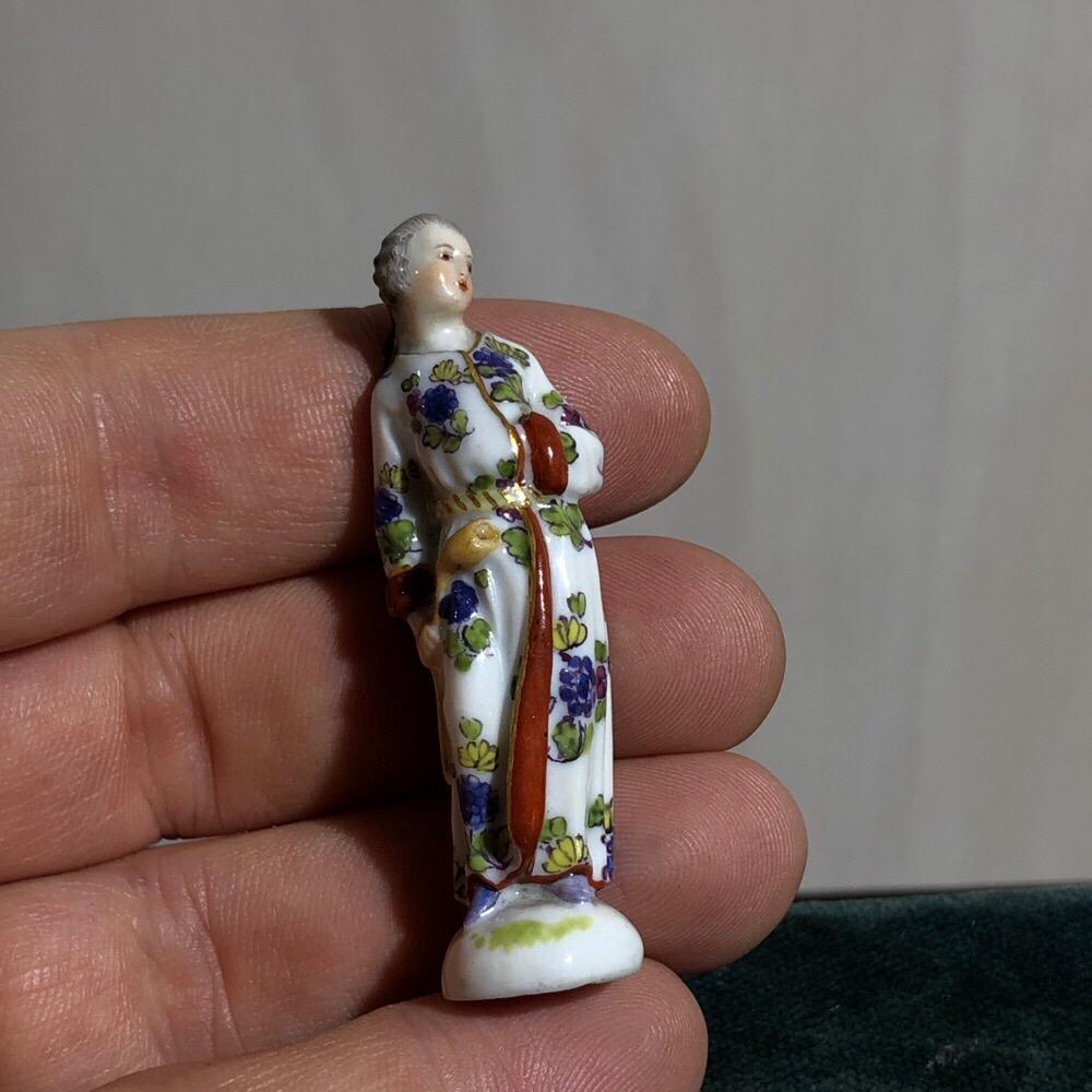 German Meissen Miniature Figure, Man in Gown with Pipe, Probably a Pipe Tamper