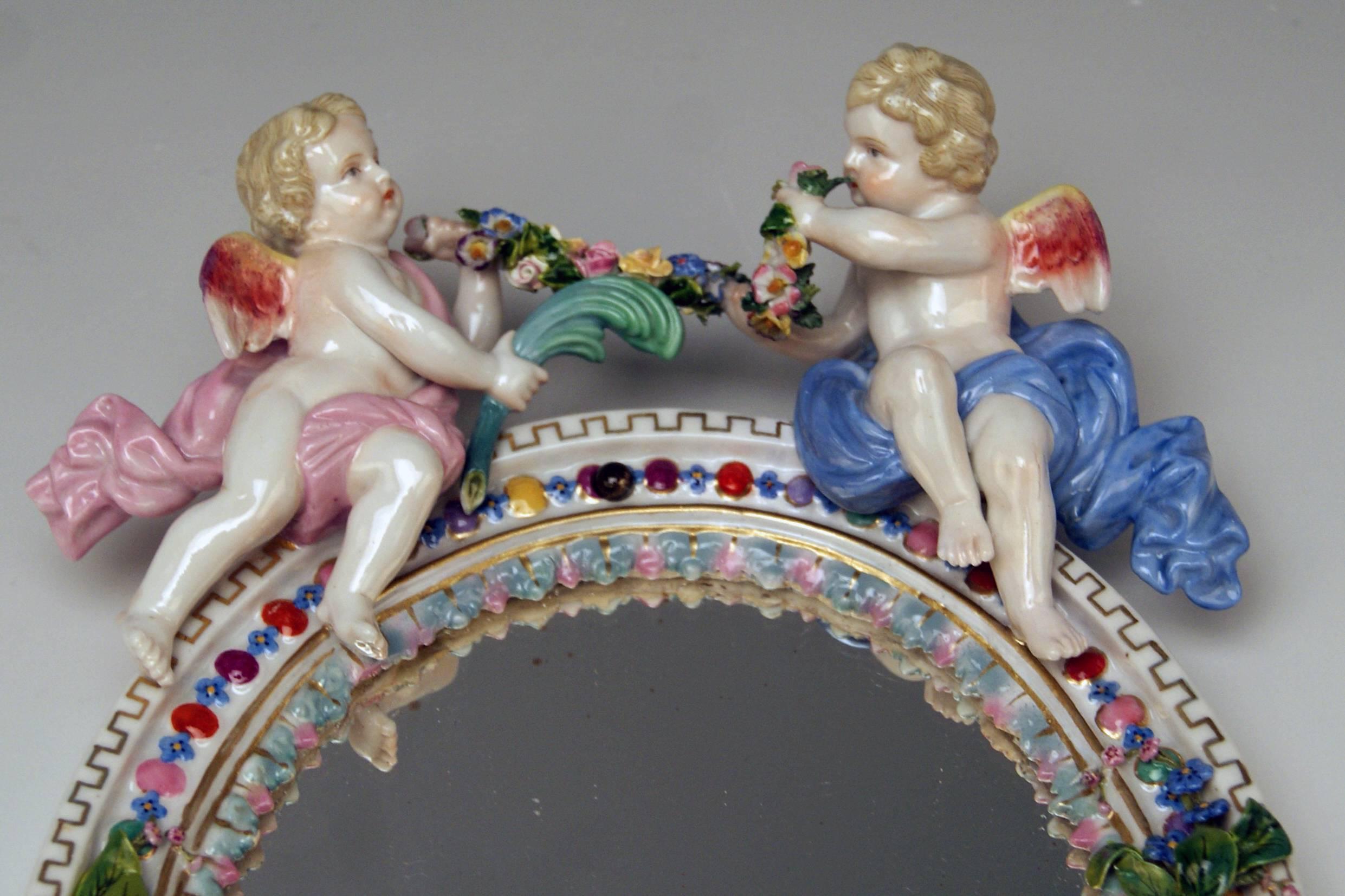 Meissen wall mirror with cherubs

Manufactory:  Meissen
Dating: 19th century / made circa 1850
Material: white porcelain , glossy finish
Technique: porcelain (modelled and fired) / multicolored painted

Item type:
Meissen stunning wall