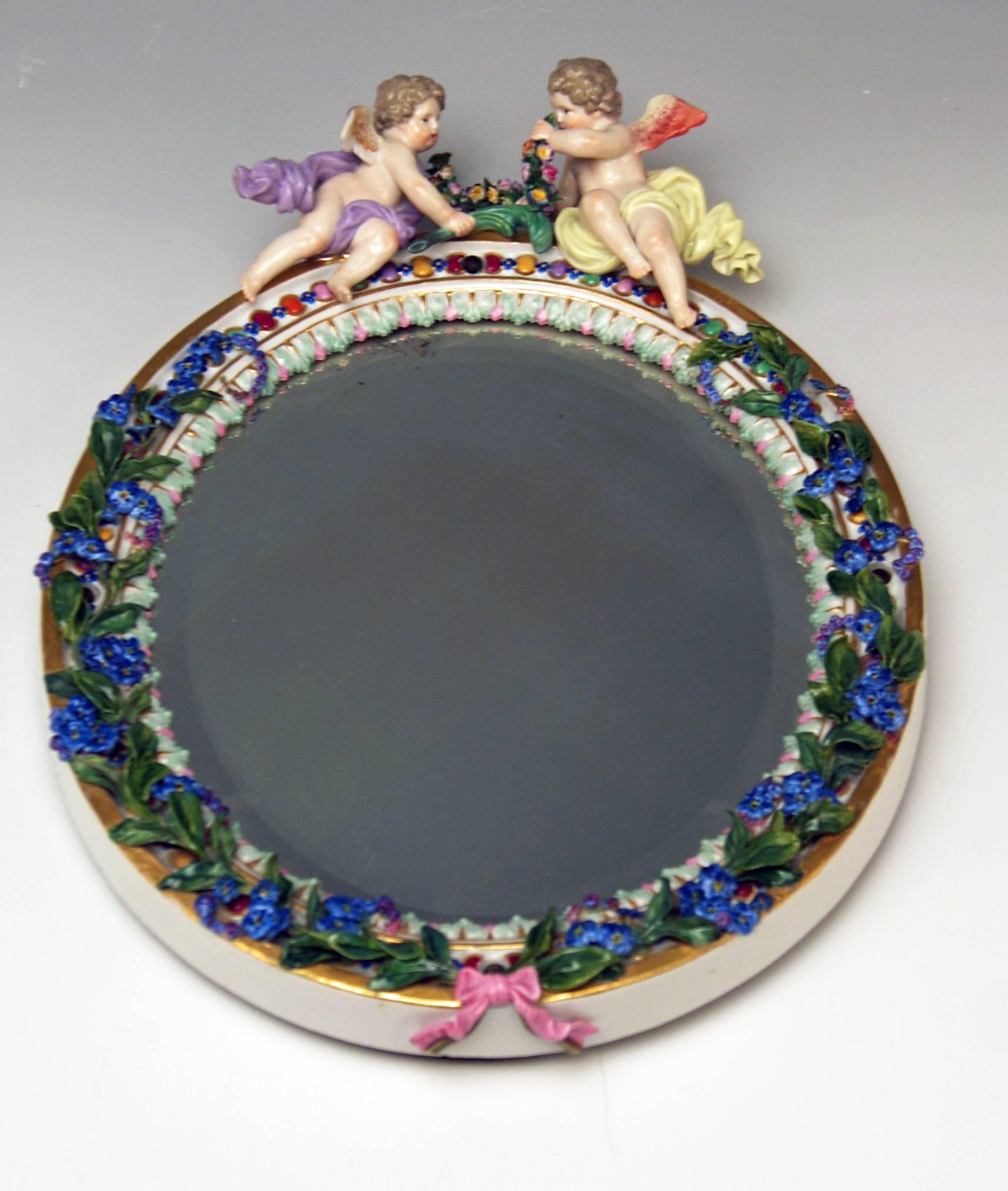Meissen wall mirror with cherubs

Manufactory:  Meissen
Dating: 19th century / made circa 1870
Material: white porcelain , glossy finish
Technique: porcelain (modelled and fired) / multicolored painted

Item type:
Meissen stunning wall
