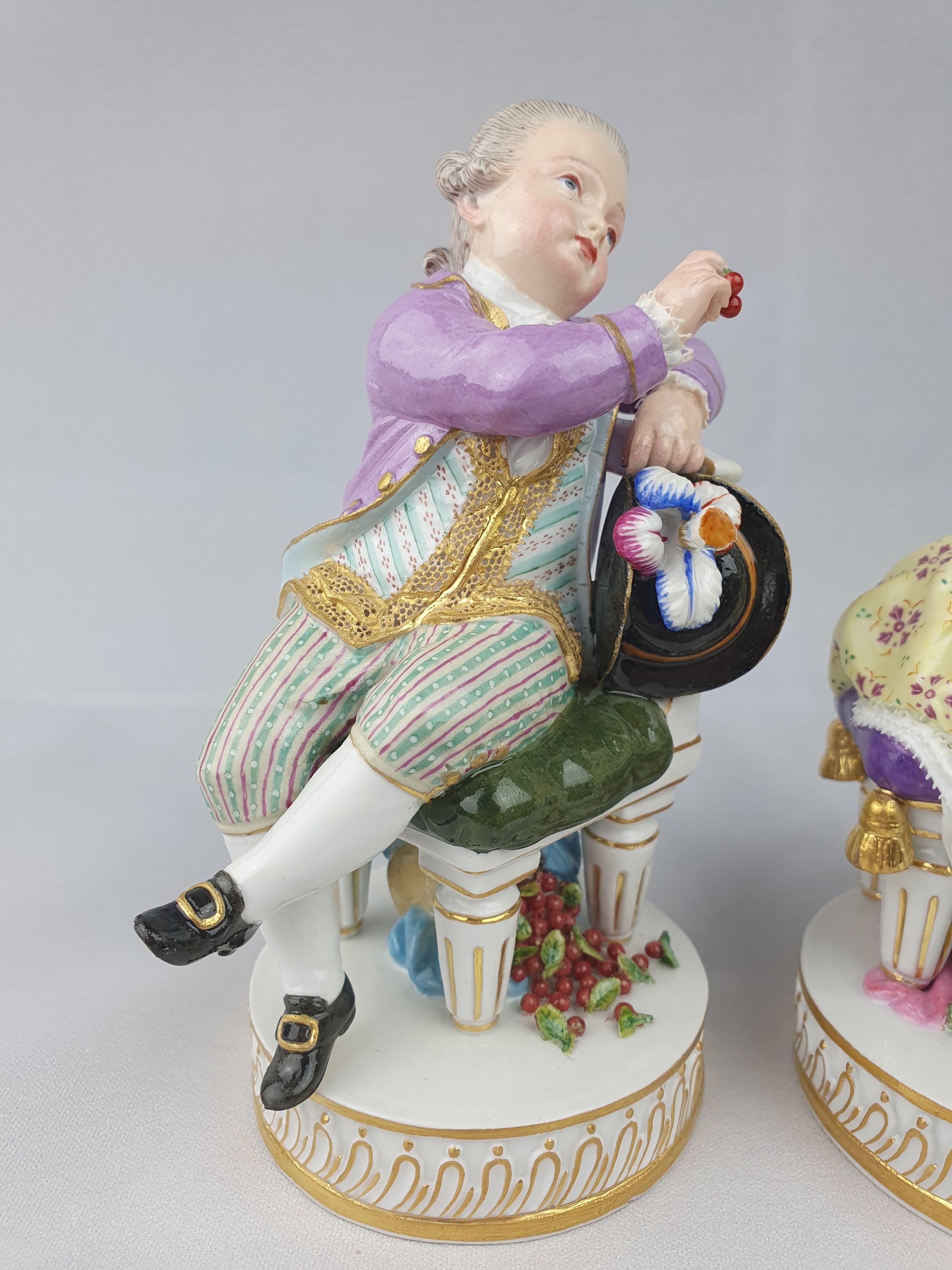 Meissen pair figures seated young man offering cherries to seated young girl holding a book. First modelled by Acier in 1776.

Model Number F51

circa 1860

Height Man – 13.5cm Girl – 13.2cm

Blue crossed swords.