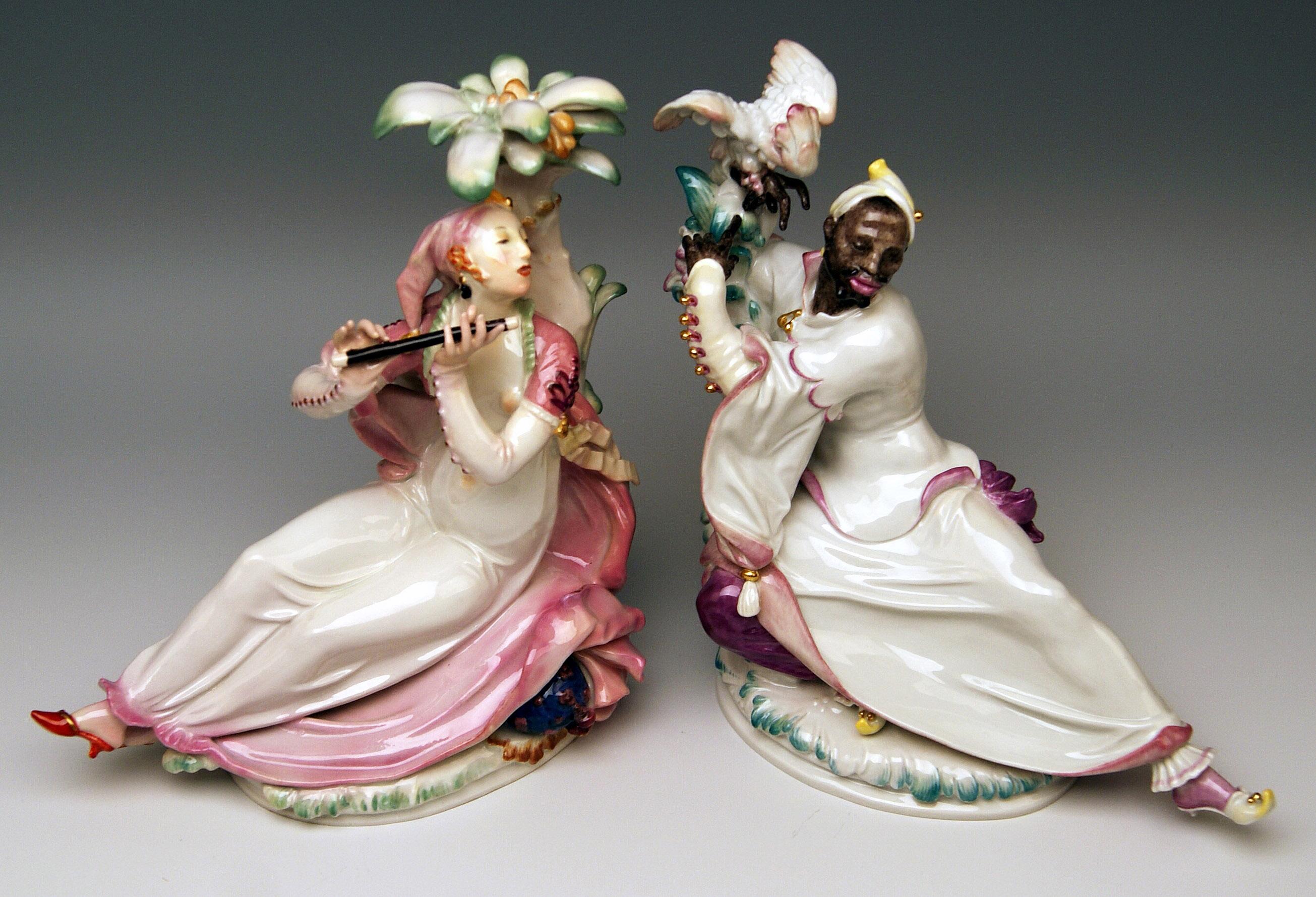 Meissen most remarkable pair of figurines: Designed by Paul Scheurich (1883-1945)
Oriental woman with flute / modelled 1926
Black man with cockatoo / modelled 1922.

Size:
Female flute player:
Height  8.66 inches / 22.0 cm
Width 7.87 inches /