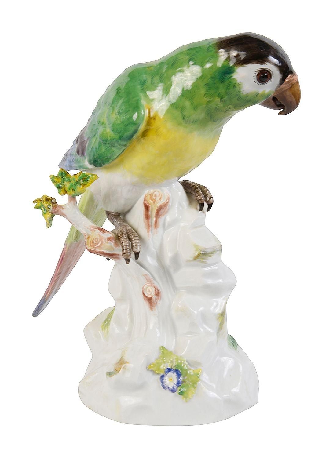 Meissen porcelain Parrot, late 19th Century, having wonderful bold colouring, perched on a tree trunk, blue crossed swords signed to the base.

Batch 76 YNKZ. G100038/23
