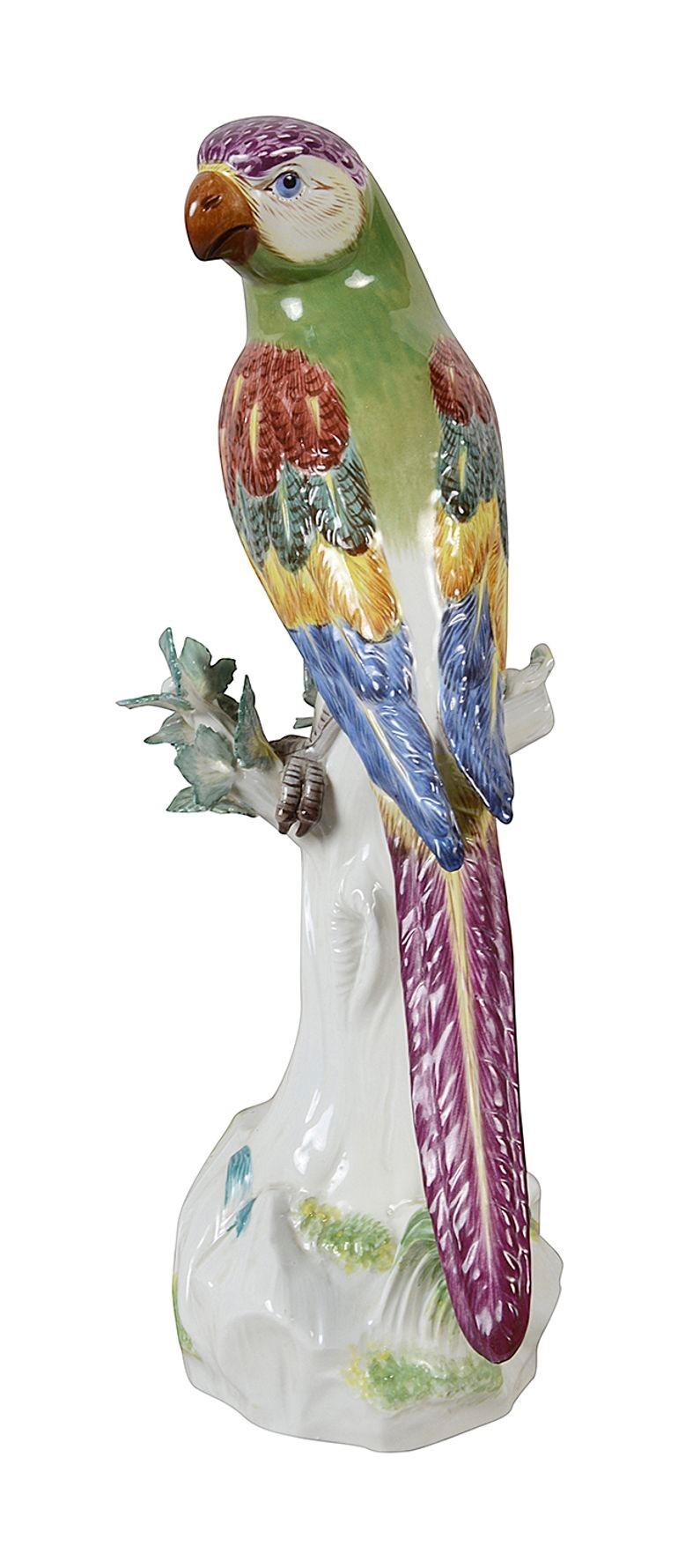 A fine quality late 19th Century Meissen porcelain Parrot perched on a tree trunk, having wonderful bold colouring.
Signed to the base with blue crossed swords.

Batch 77 62748 DNKZZ