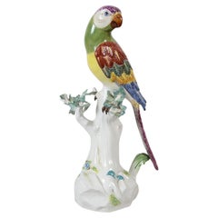 Meissen Parrot perched on a tree trunk, 19th Century