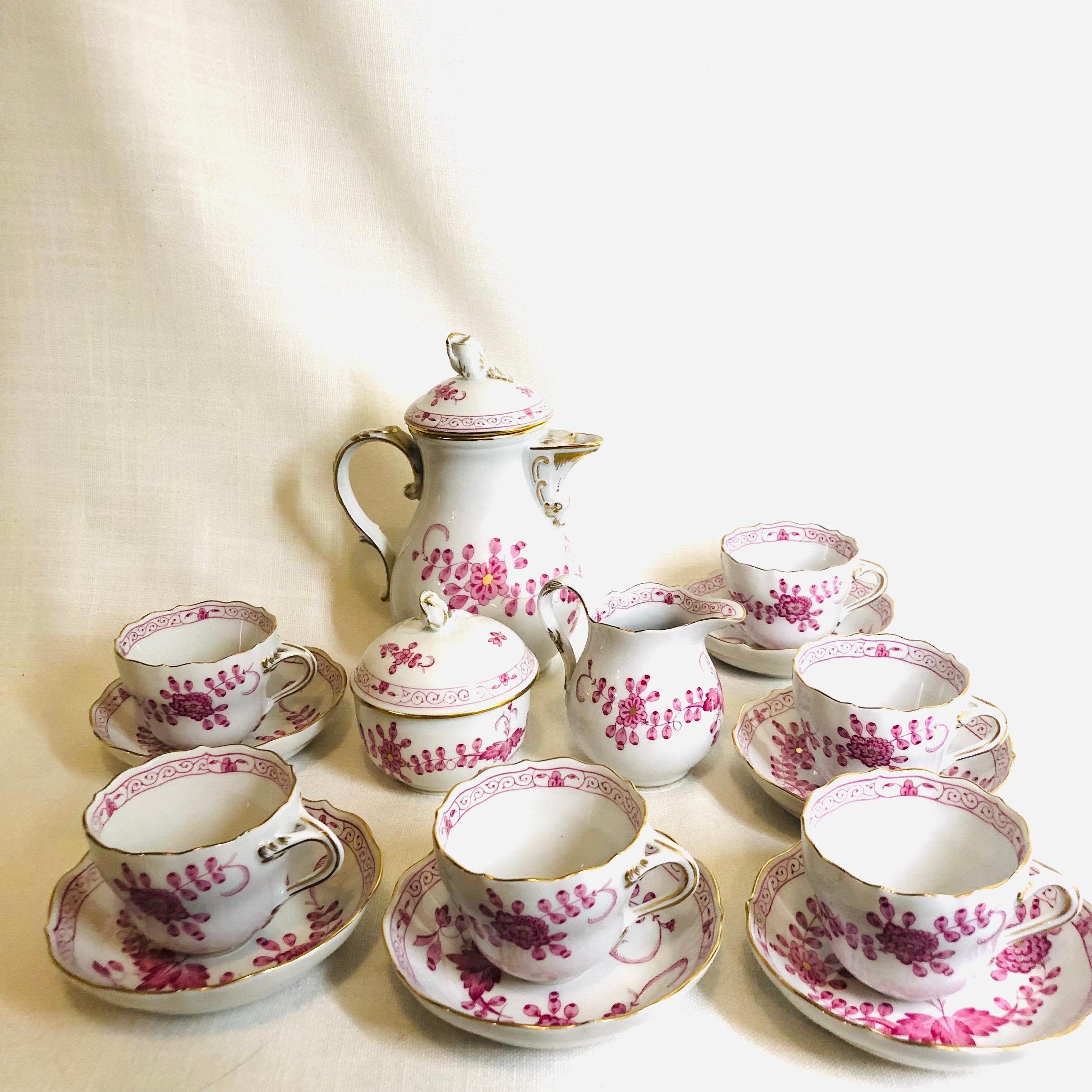 This is a wonderful pink Indian Blumen demitasse set, which includes a demitasse pot, a sugar and creamer and six demitasse cups and saucers. This is a perfect set for expresso or hot chocolate. I love the pink color, the painting and the shape of