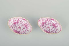 Meissen, “Pink Indian”. Pair of small oval porcelain bowls, early 20th C.