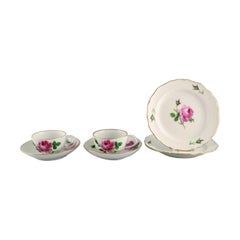 Meissen Pink Rose. Two teacups with saucers and two plates in porcelain.