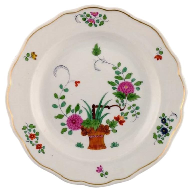 Meissener Teller aus handbemaltem Porzellan mit Blumenmotiven, frühes 20. Jahrhundert