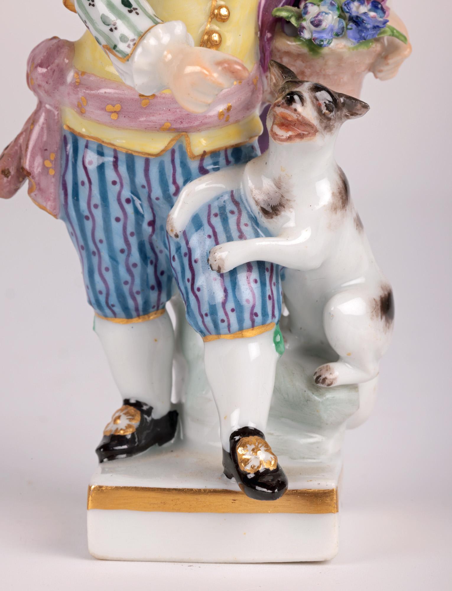 Vernissé Figurine en porcelaine de Meissen représentant un garçon avec un chien en vente