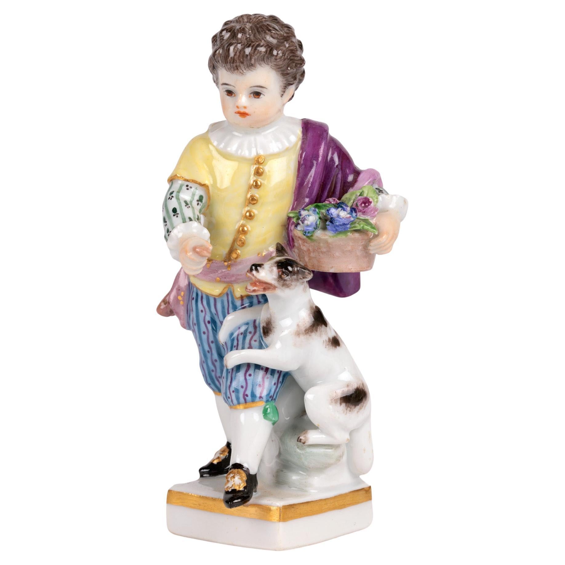 Figurine en porcelaine de Meissen représentant un garçon avec un chien