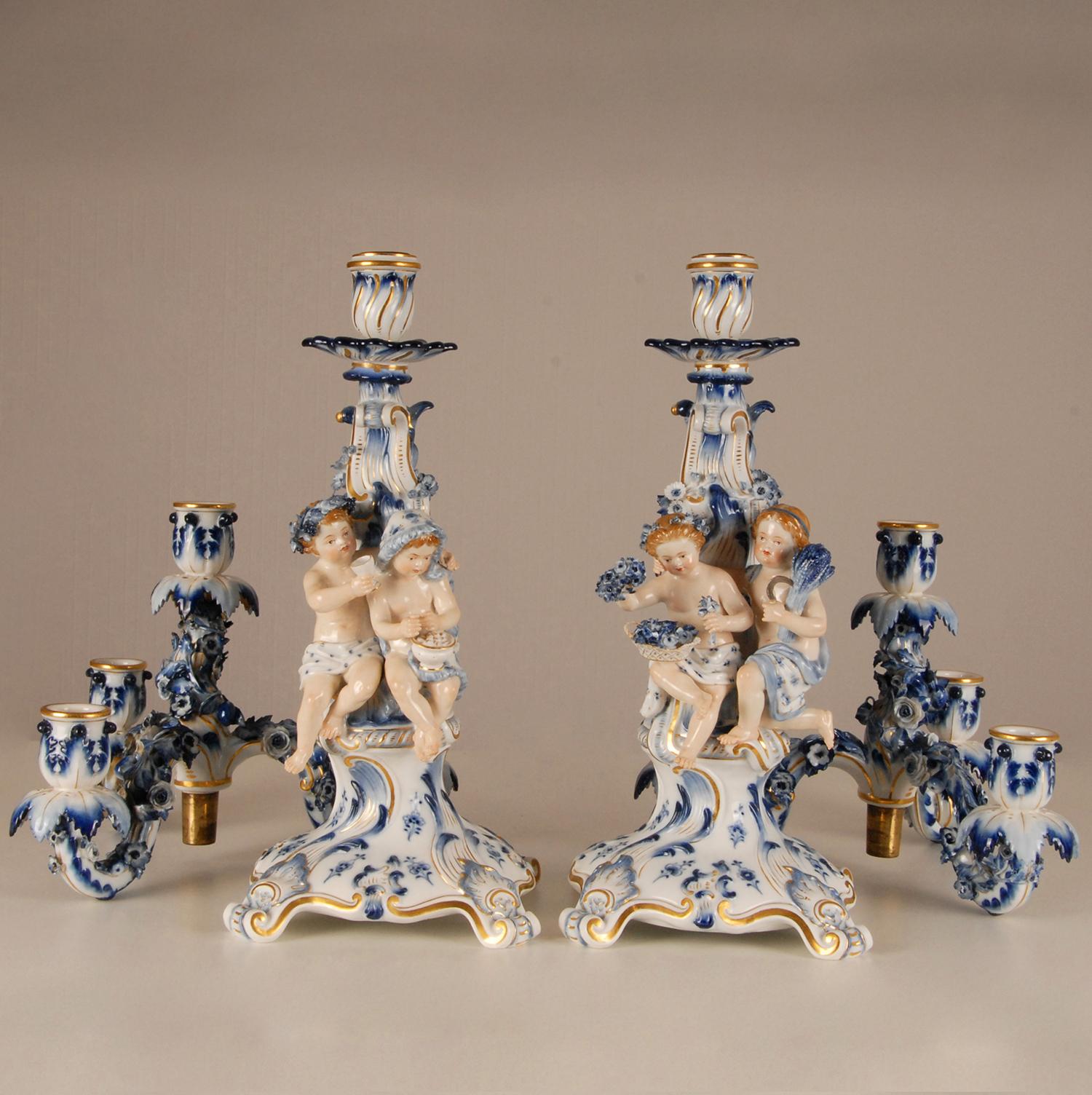 Meissen Porcelain Candelabras antique German porcelain - a pair
Each with 4 lights and 2 figures, emblematic of the four seasons.
The candelabras are made in the blue and white union pattern
Very elaborated with cherubs and loads delicated applied