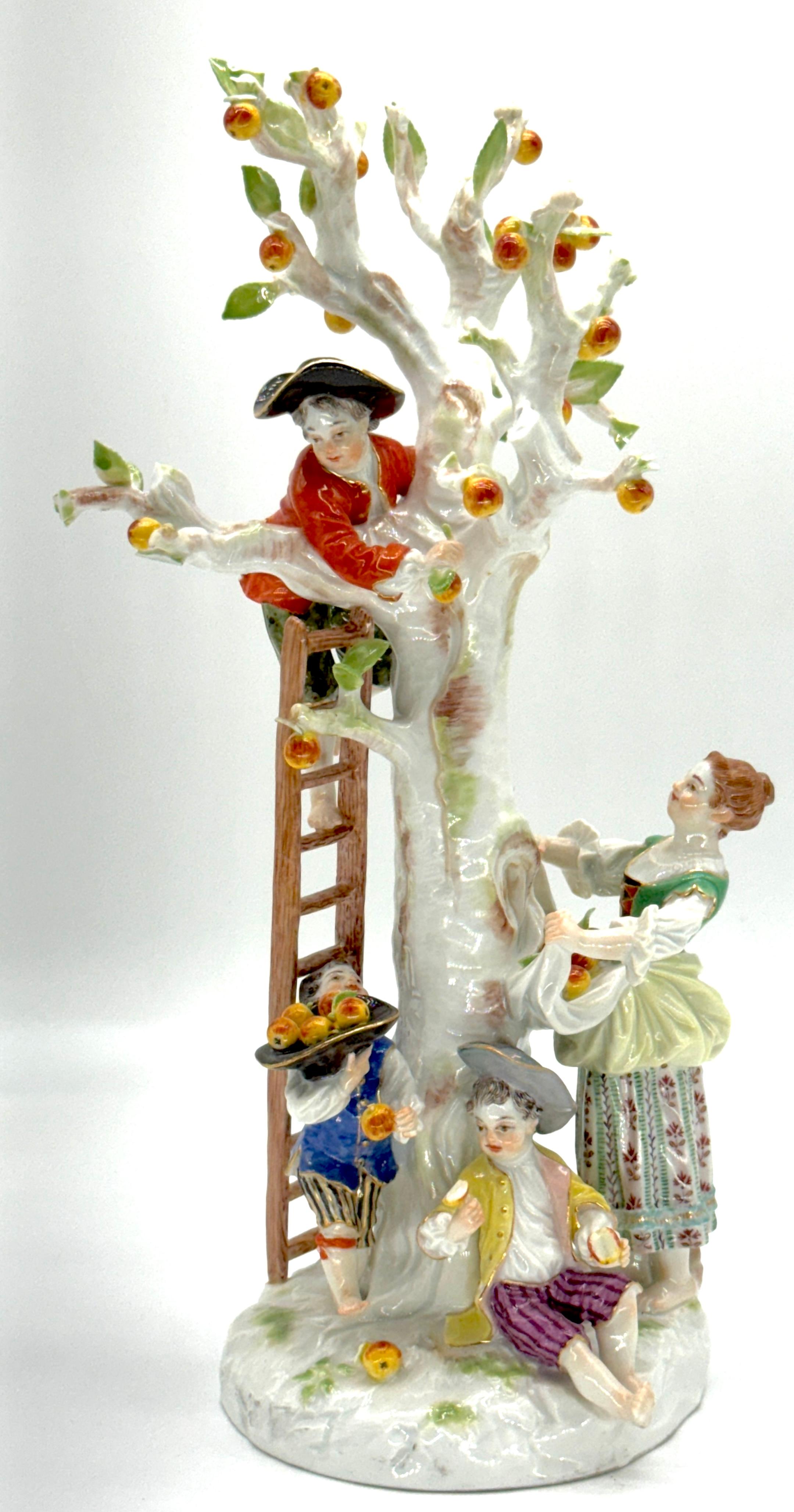 Meissen Porcelain Figure Group of Apple Pickers
Germany, 20th century 

This exquisite Meissen Porcelain Figure Group of Apple Pickers, made in Germany during the 20th century, stands as a vibrant homage to the original 1751 model by J.J. Kaendler