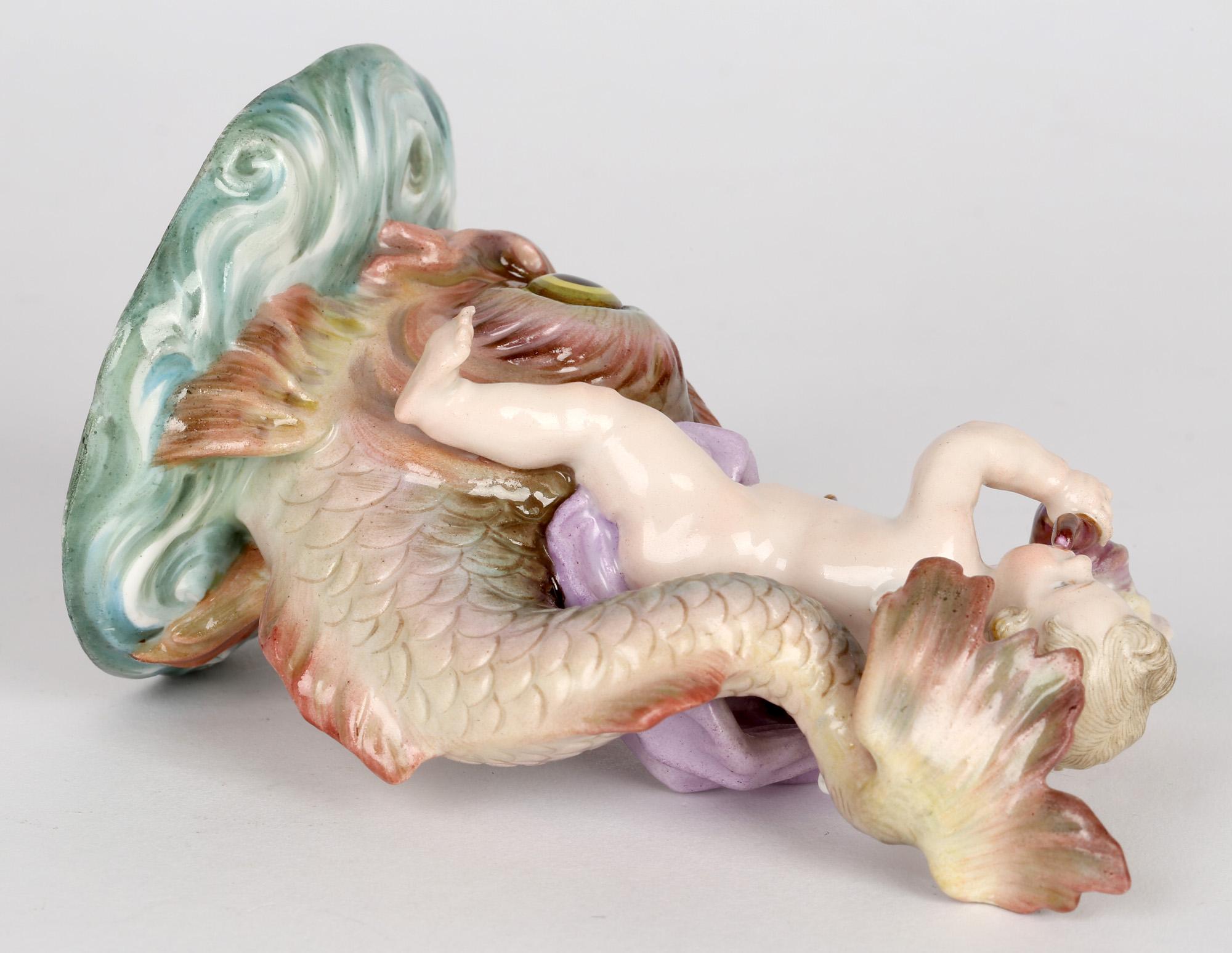 19th Century Meissen Porcelain Figure of a Cherub Playing a Horn Riding on a Large Fish