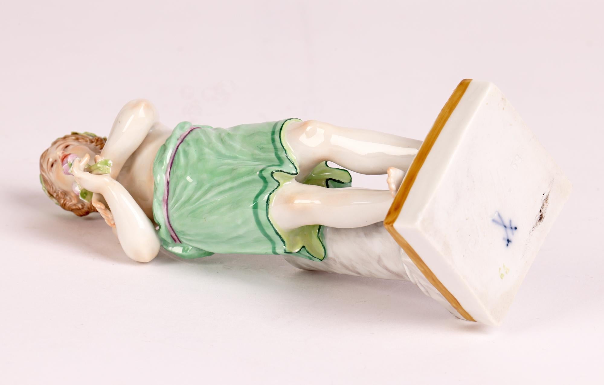 Mid-19th Century Meissen Porcelain Figure of a Classical Boy Holding Flowers For Sale