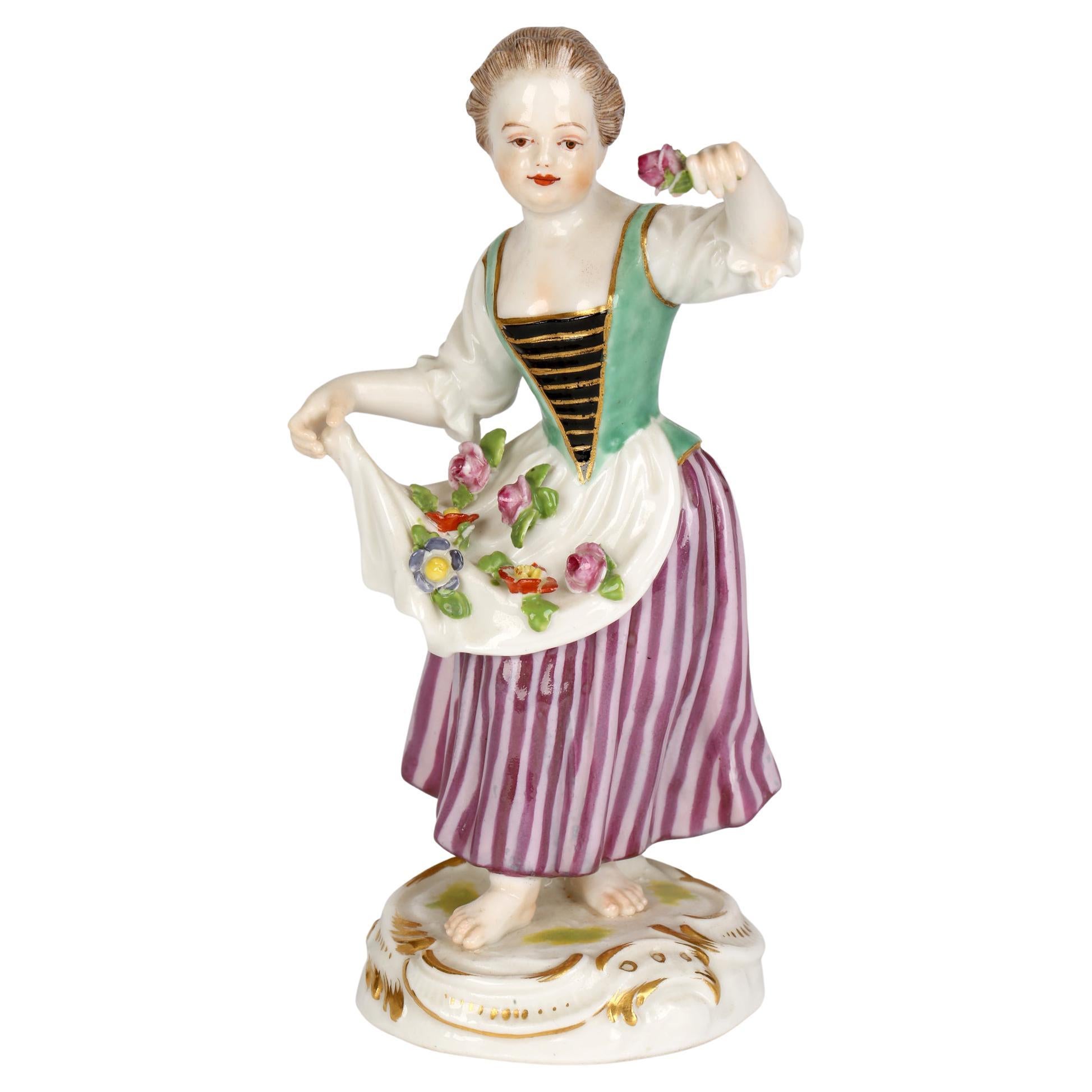 Meissen Porcelain Figure of a Girl Gathering Flowers