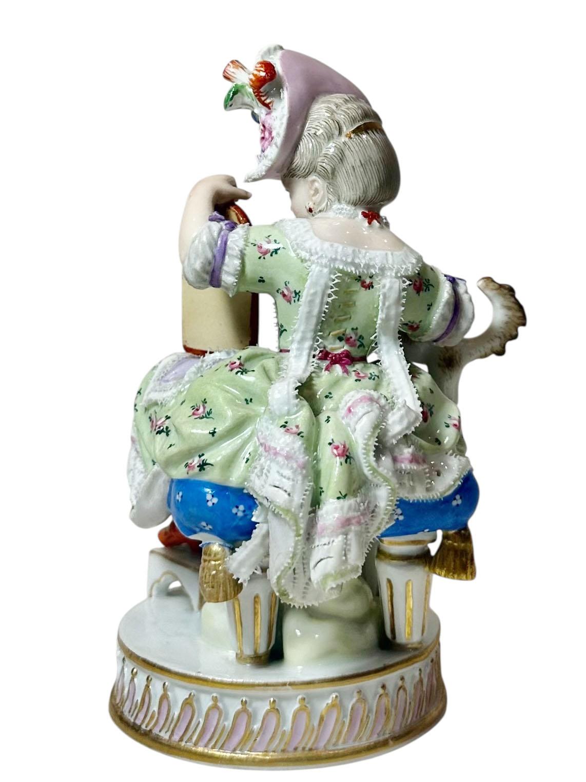 Porcellana Meissen Porcelain Figure of a Girl with a Dog and Looking Glass in vendita