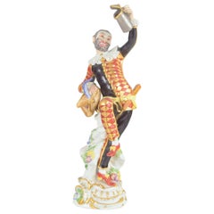 Meissen. Porcelain figure of “Harlequin” in a classic Commedia dell’arte costume