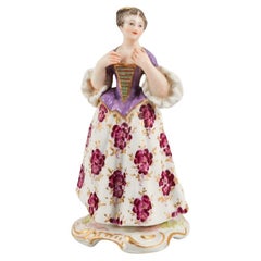 Antique Meissen, porcelain figurine of a lady in fine dress, late 19th century