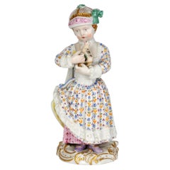 Meissen Porcelain Figurine of a Young Girl Holding a Pull Along Animal Toy
