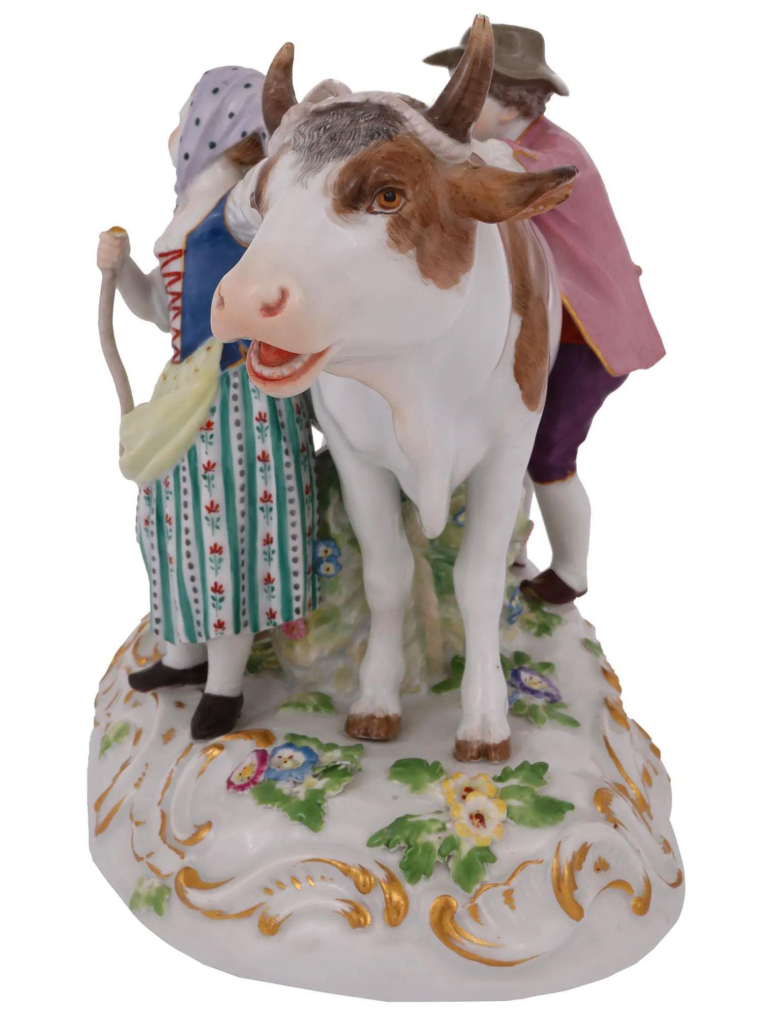 Our charming figurine from Meissen depicts a boy and girl with work bull. With blue underglaze mark of Meissen and impressed model number R78 and smaller impressed number 131.