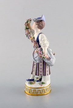 Meissen Porcelain Figurine, Woman in Purple Dress with Flowers, circa 1900
