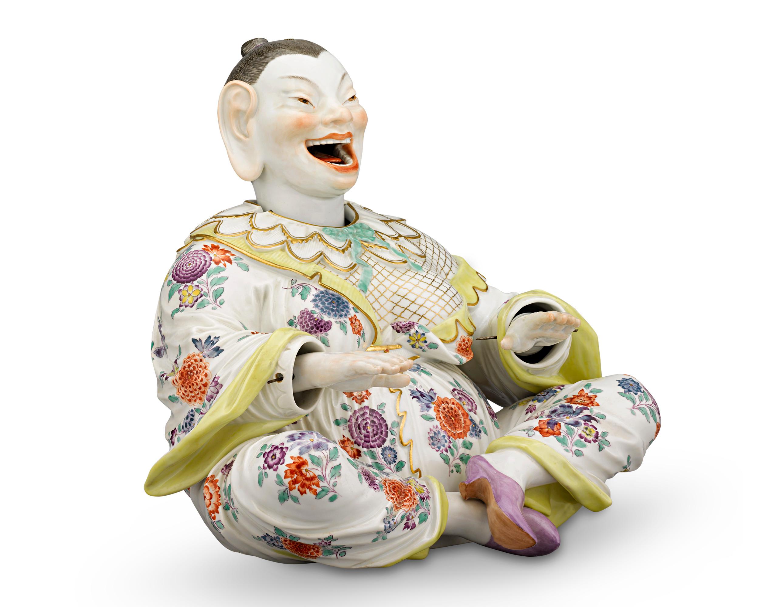Crafted by the legendary Meissen, this charming porcelain nodder takes the form of an Asian woman in vividly hued garments. The perfectly balanced design includes hidden springs on the interior that set the figurine into motion with the slightest