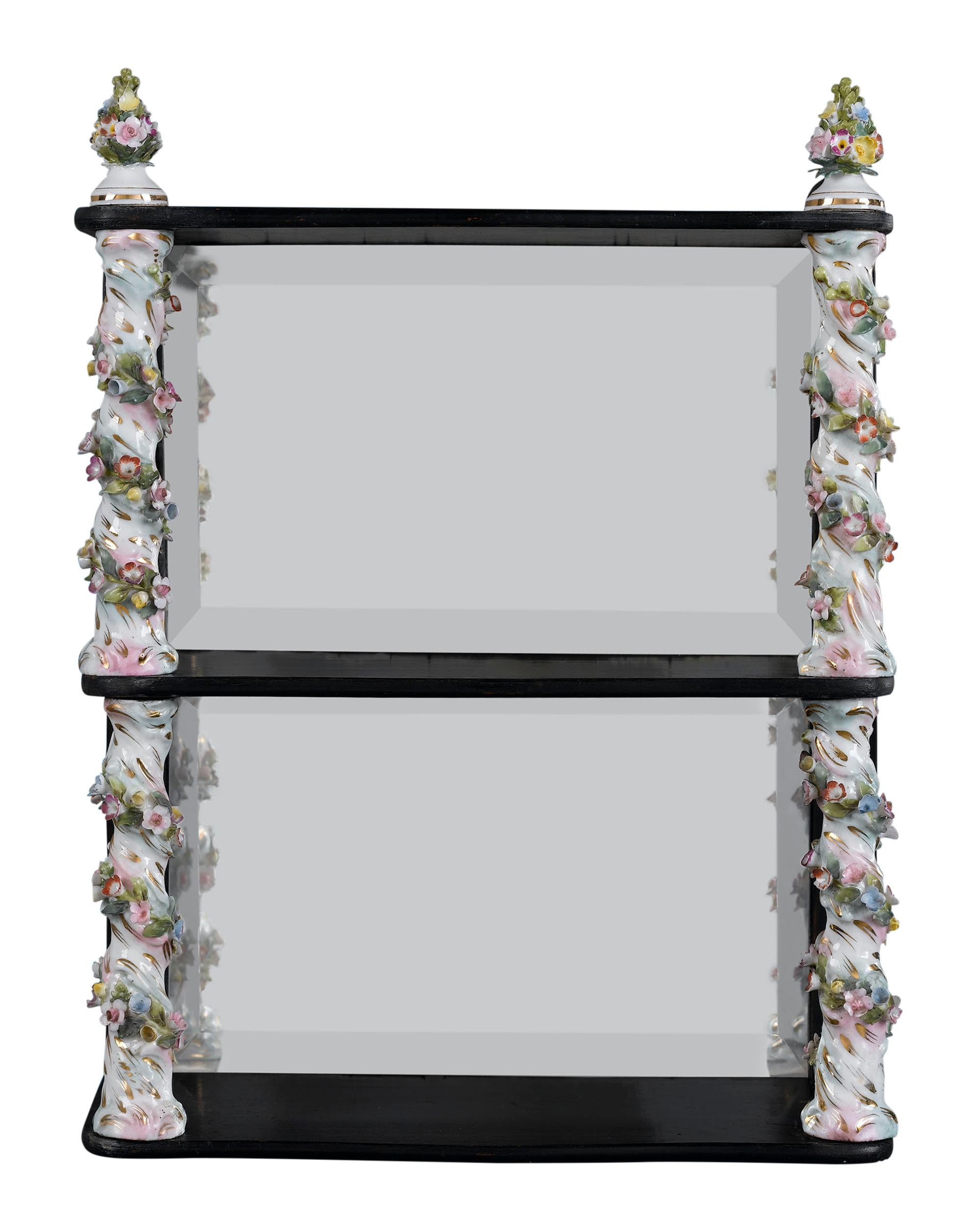 Elegant pillars of Meissen Porcelain distinguish this lovely pair of shelves. An ebonized wood frame gives them structure, and a mirrored backing completes their design.

circa 1880

Measures : 10