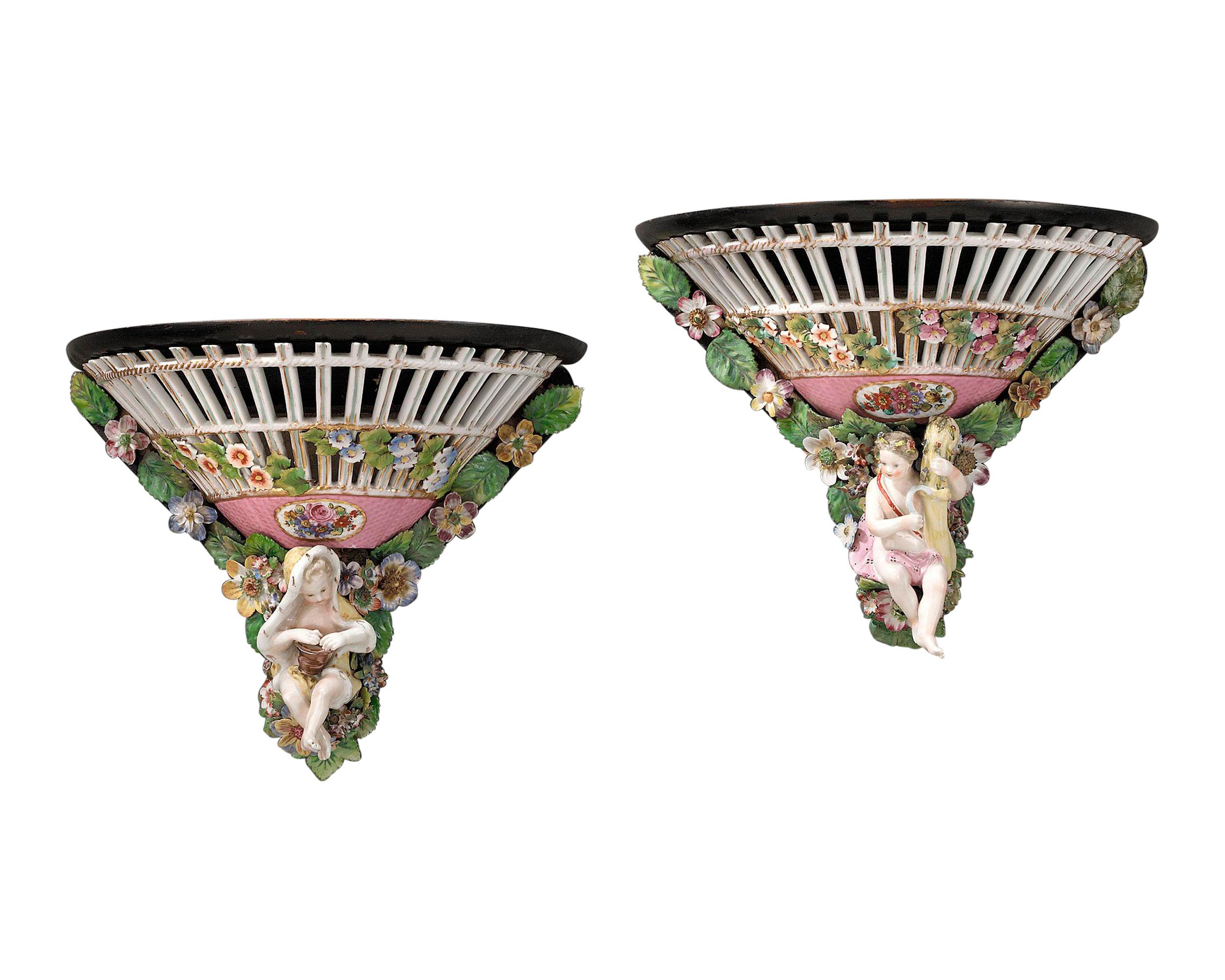 A fine pair of ebonized wood wall shelves mounted with colorful Meissen porcelain of the highest quality. Excellent condition.

Circa 1870

11 1/2